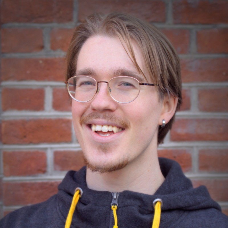 A portrait image of Benjamin Borgen Whistler smiling at the camera.